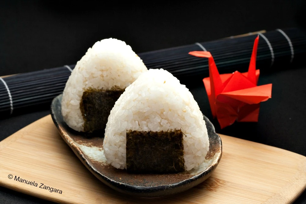Onigiri - traditional Japanese rice balls wrapped in seaweed, used as food inspiration for the 3D model